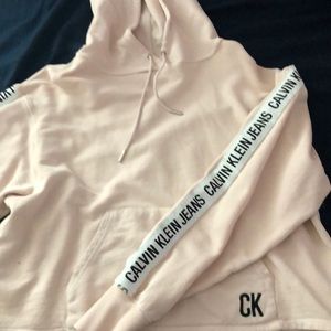 light pink Calvin Klein cropped hoodie